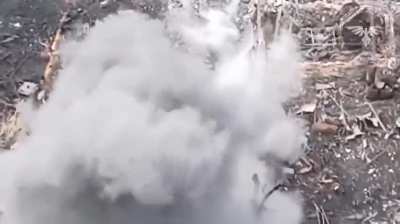 Concrete slab provides inadequate drone protection for invading Russian soldier.