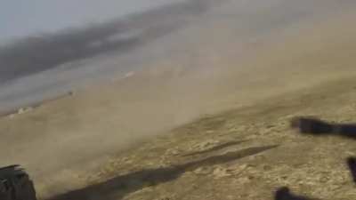 Volunteer Soldier for the Kurds Freaking Out on an Oncoming Suicide Bomber