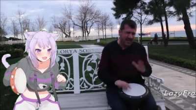 Okayu plays Ievan Polkka with street drummer