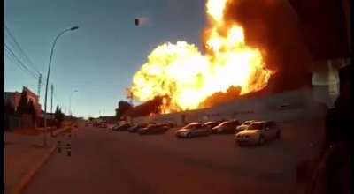 That isn't a barrel flying up, it's a car