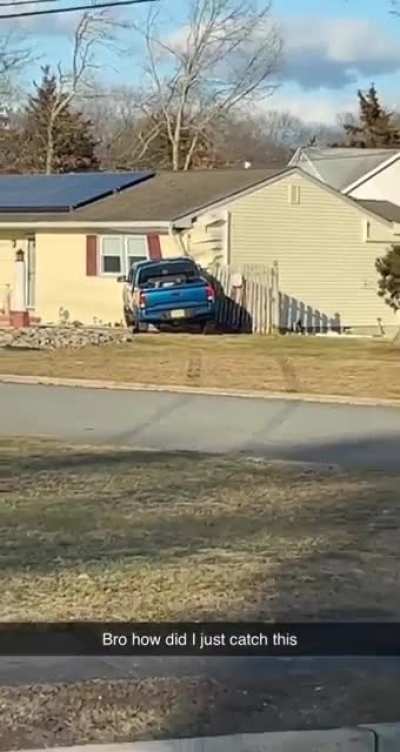 Guy drives into house across the street