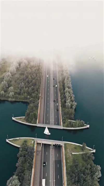 In Netherlands there is a unique 'reverse bridge' (Veluwemeer Aquedict)