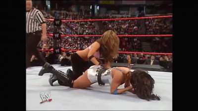 An overconfident Candice Michelle gets her clothes ripped off by Maria of all divas