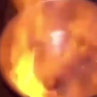 people playing beyblade with a pot