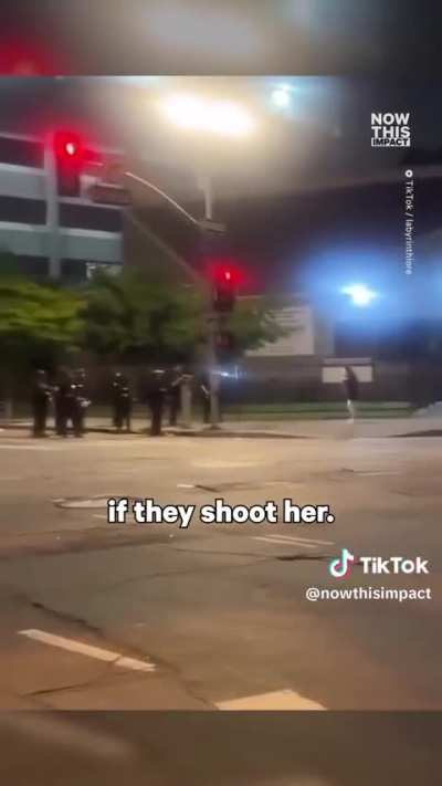 Officers fired a nonlethal round at a woman walking home alone from close range after blocking her from reaching her apartment during the ICE protests in LA. A witness caught the moment on camera and ran to help the woman before they were shot at again an