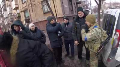While moving with provisions to the soldiers defending the city, the Azovs were stopped by citizens asking for help with food. Defenders of the city shared their modest reserves to feed at least a few children and the elderly. Mariupol, Ukraine
