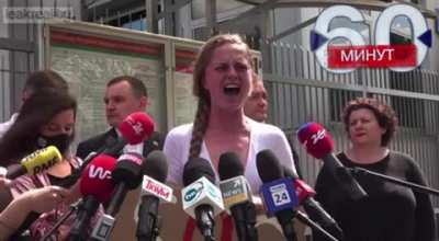 Woman at a press conference, Russia