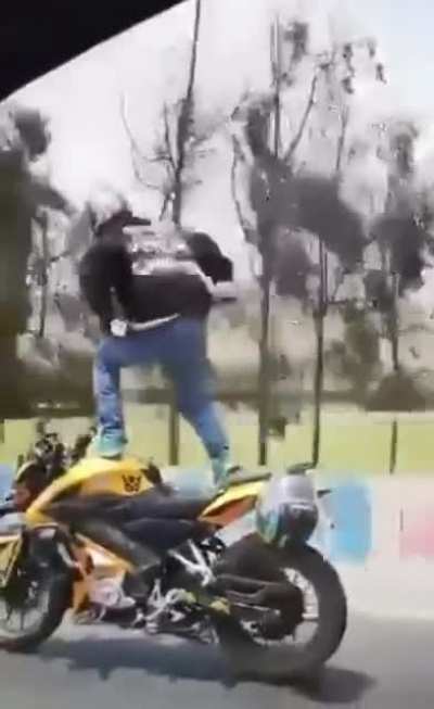 Standing on a moving bike