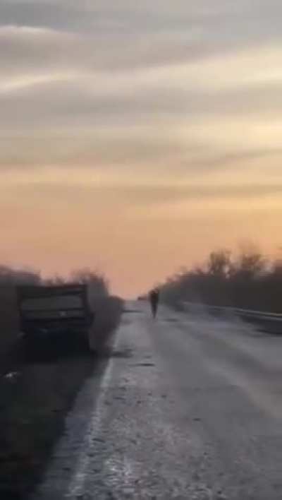 Russian sapper Tries to stop a desertcross from running into a mined section of the road, sapper is ignored and run over. Vid cuts just as explosion happens.