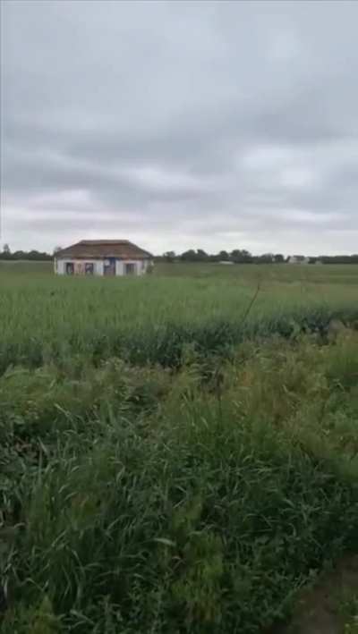 ua pov Ukrainian vehicle drives by while camouflaged as house
