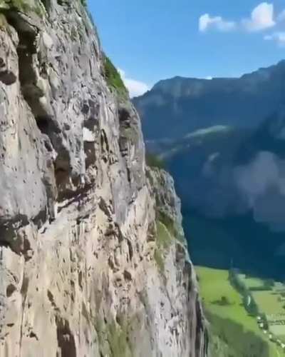Walking on iron bars embedded on the slopes while enjoying the great scenics