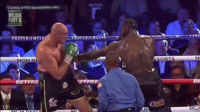 Tyson Fury drops Deontay Wilder with a body shot in round 5. 22nd Feb 2020.