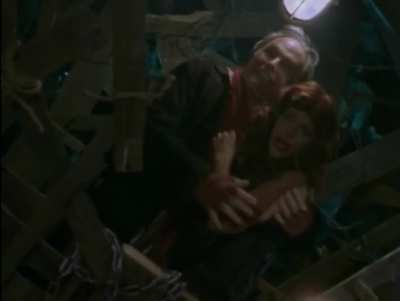 Michelle Lintel Knees (1x3, 1x21) and Kicks (1x4, 1x6) Men in the Balls in Black Scorpion (2001)