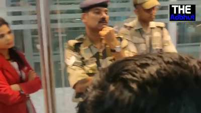Indian airport worker defending herself.