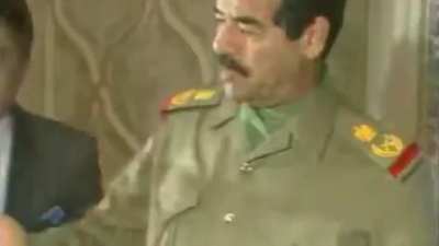 Saudi Arabia king gives Saddam Hussein a golden AK as a gift in 1984