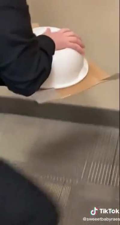 A joke at work with catching a mouse