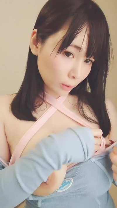 Gorgeous Japanese girl showing off her big assets