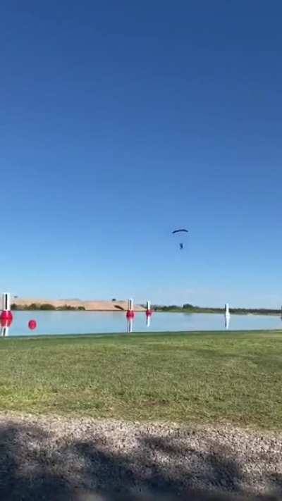 A skydiver trying to land safely.