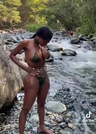 Giving her big boobs a squeeze