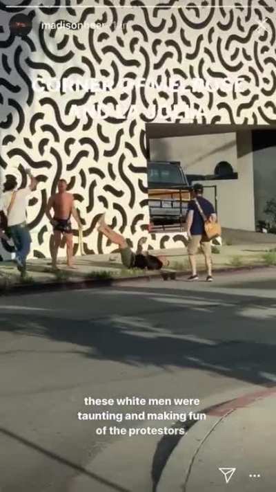 Taunt protesters, knocked out