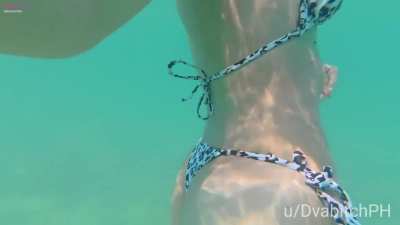 What a naughty day at the beach for a swimming and flashing