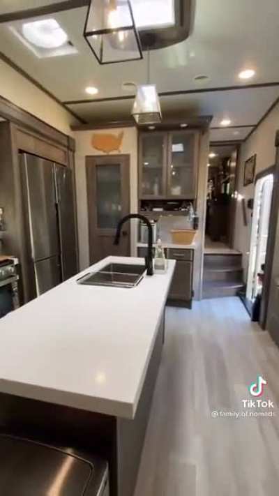 “Look how awesome this RV we live in is!”(Ignore the 3 kids stuffed into a tiny room) -the parents probably