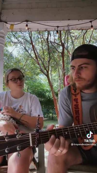 Motorcycle by Colter Wall with the family in the backyard