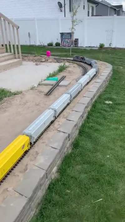 My two addictions. Gardening and trains. I’ve been working on my G scale garden railroad “Gem State Railroad” for the last 3 years here in Idaho. It stays out year round. I even have a snow plow I use in the winter. The trains run off batteries so no trac