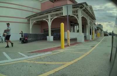 Woman at walmart almost hits me, nearly runs over a mother & child, and proceeds to attempt to physically attack me.