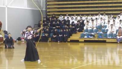The sound of an arrow being released from bow during a Kyudo (Japanese archery) demonstration