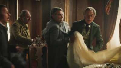 Grazi Massafera lets the sheet fall and stands naked in front of a few guys!