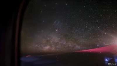 I had a row to myself on the plane so I set up my tripod on the window seat and captured a timelapse of the Milky Way Galaxy rising