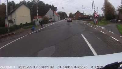 Belgian bus driver saves a woman from being run over by a train