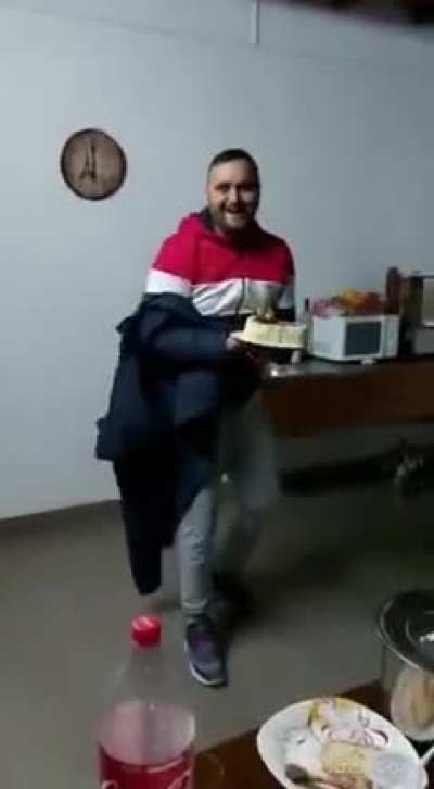 A drunk guy and his cake