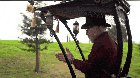 Adam Savage in a rickshaw pulled by a robot