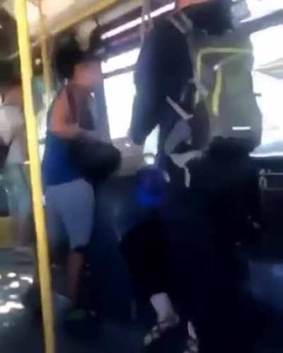 Racist women gets dropped after spitting in womens face