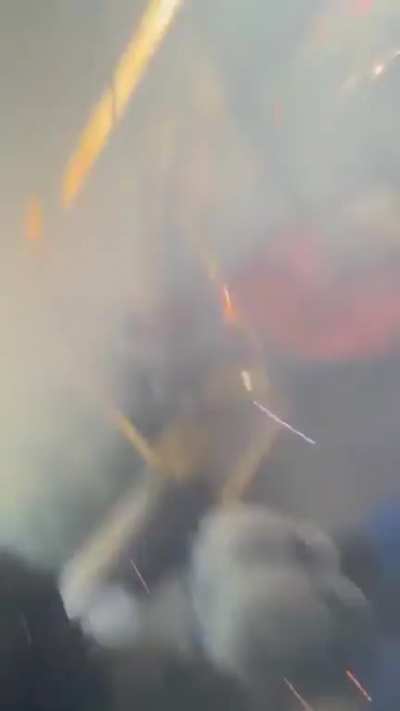 Man sets off a firework inside a crowded bus.