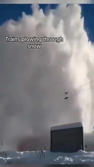 Trains removing snow is incredible to watch