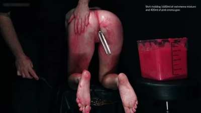 The scene closes with me getting the hooded and inflated Violet off while she's holding almost three litres of red enema mixture and pink enema goo. Sound on Redgifs.