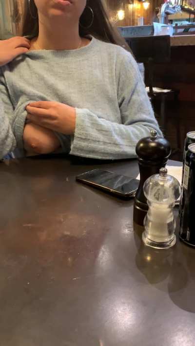 Some shy titties in the restaurant