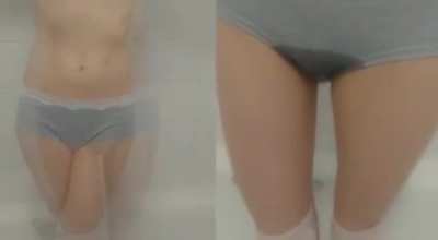 In the bathtub Holding on the left, letting go on the right
