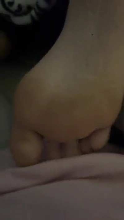 My girlfriend wanted me to take off her sweaty socks before she fell asleep. Had to capture her perfect soles🤤