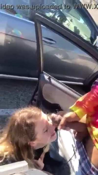BBC facial in a parking lot.