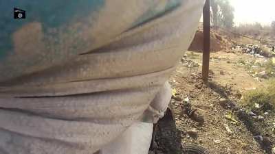 GoPro footage of an ISIS fighter killing several Iraqi soldiers in Close Quarters before being killed himself by an Iraqi soldier. The Iraqi soldier is visible in the video. Ramadi. 2014