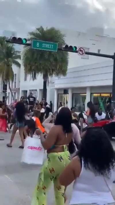 Man is Caught Dine and Dashing as Hundreds of Women Takeover Collins Avenue to Twerk in the Middle of the Road