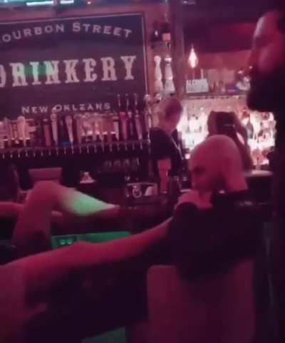 Sucking toes at a bar