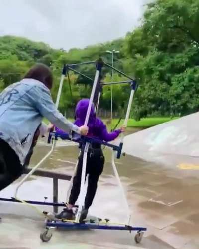 Mom helps her son with cerebral palsy skateboard for the first time on special modified board
