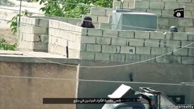SAA solider on the roof of a building get sniped in the face by an isis millitant, Syria Aleppo countryside.