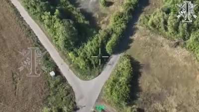 A ground drone with a machinegun targeting a Russian position in Kursk oblast