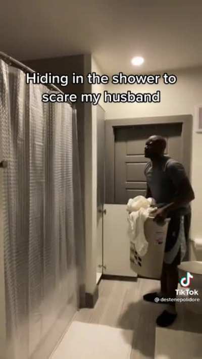 Shower hiding to scare partner